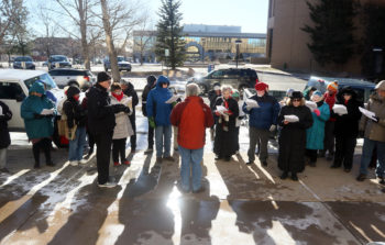 Highlands United Presbyterian Church Pastor Rodger McDaniel speaks with people during a Juntos prayer vigil in front of the United States Immigration and Customs Enforcement office on Monday, Jan. 15, 2018, in Cheyenne. Around 50 people attended the vigil to show their opposition to an ICE detention center proposed for Evanston. Blaine McCartney/Wyoming Tribune Eagle